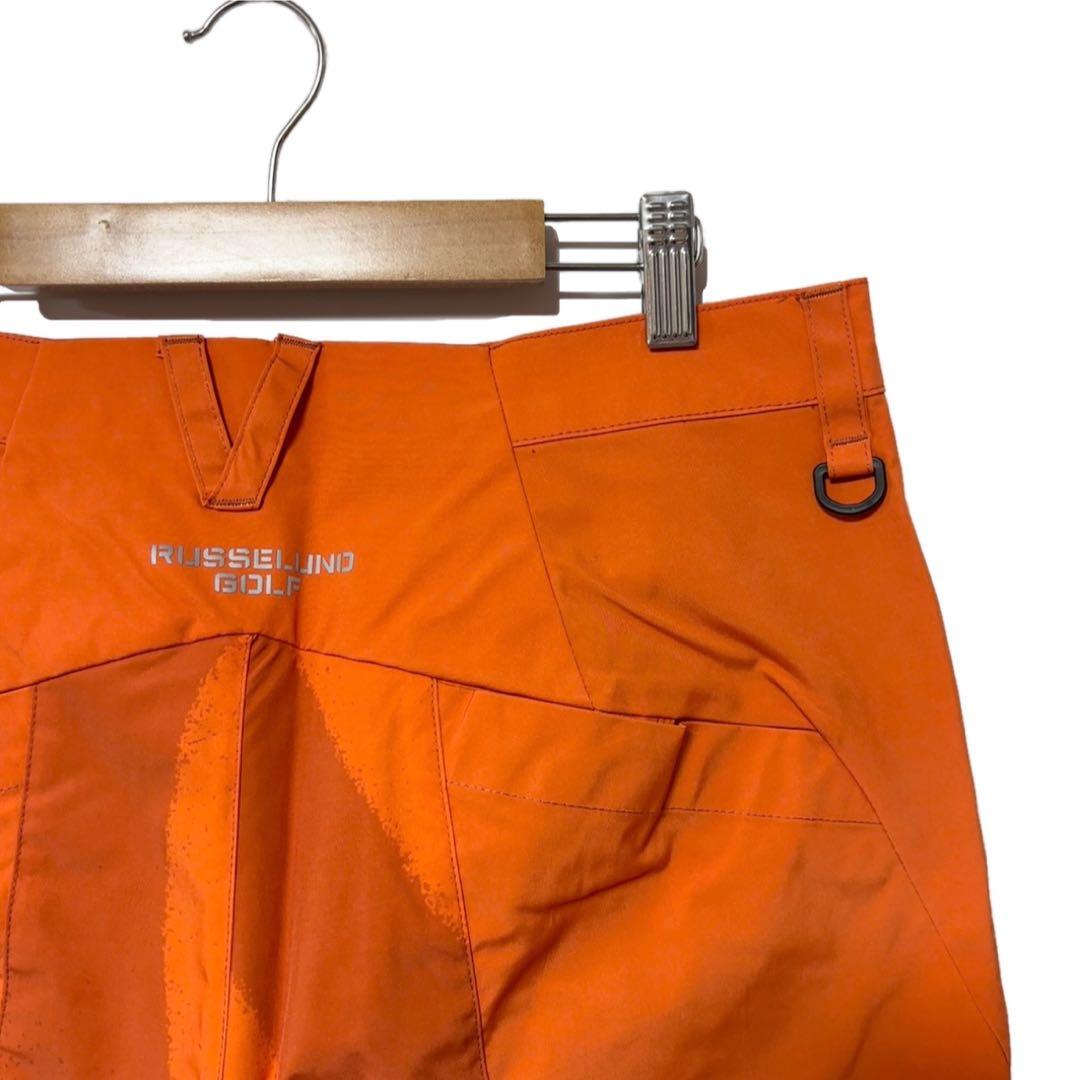 ラッセルノ ゴルフ RS ロゴ リフレクター ショーツ スプレー オレンジ L